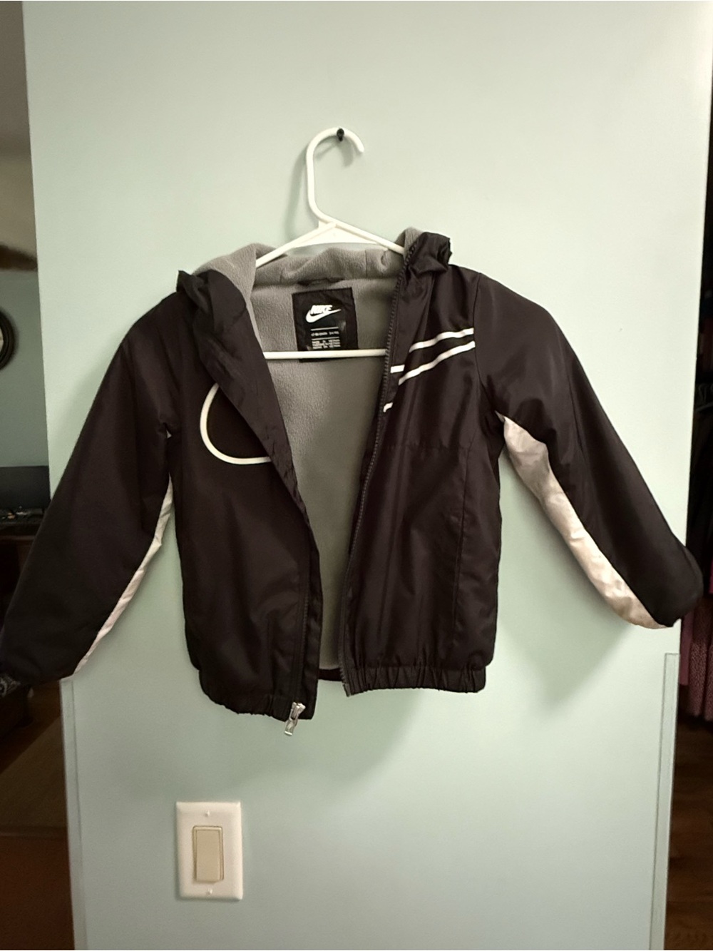 Nike Kids Black and White Hooded Rain Jacket